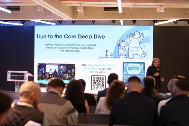 A speaker presenting the True to the Core Deep Dive session to a seated audience